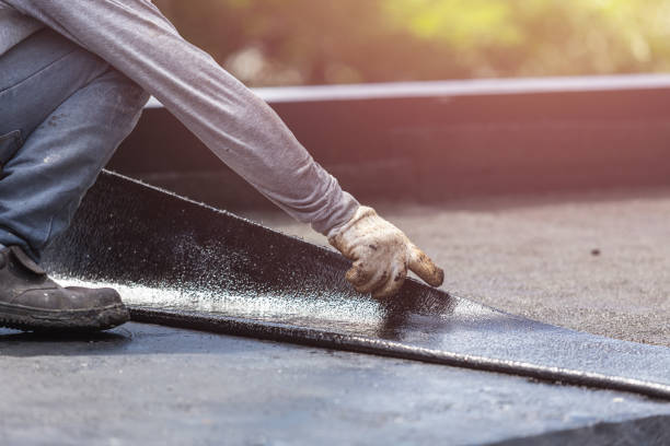 Professional Basement Waterproofing technician working in Pewamo, MI